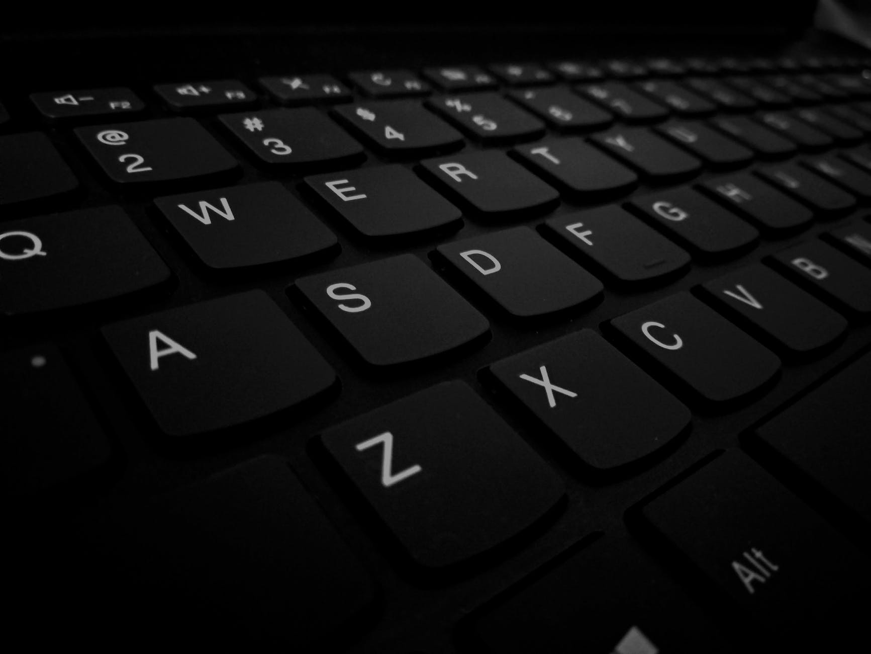closeup photo of black computer keyboard s left side keys